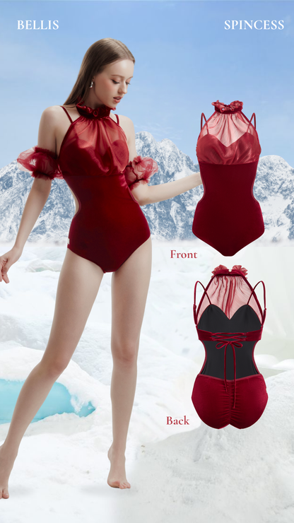 Red swimsuit with sheer details worn by a model against a snowy mountain background Bellis Leotard Bodysuit Design by Spincess Model Red