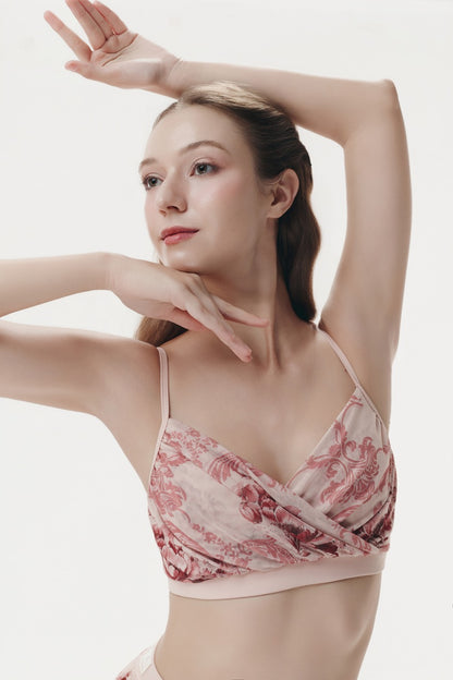 Woman wearing a patterned bralette against a plain background Woman wearing a floral two-piece outfit on a white background Serene outfit design by Spincess pink